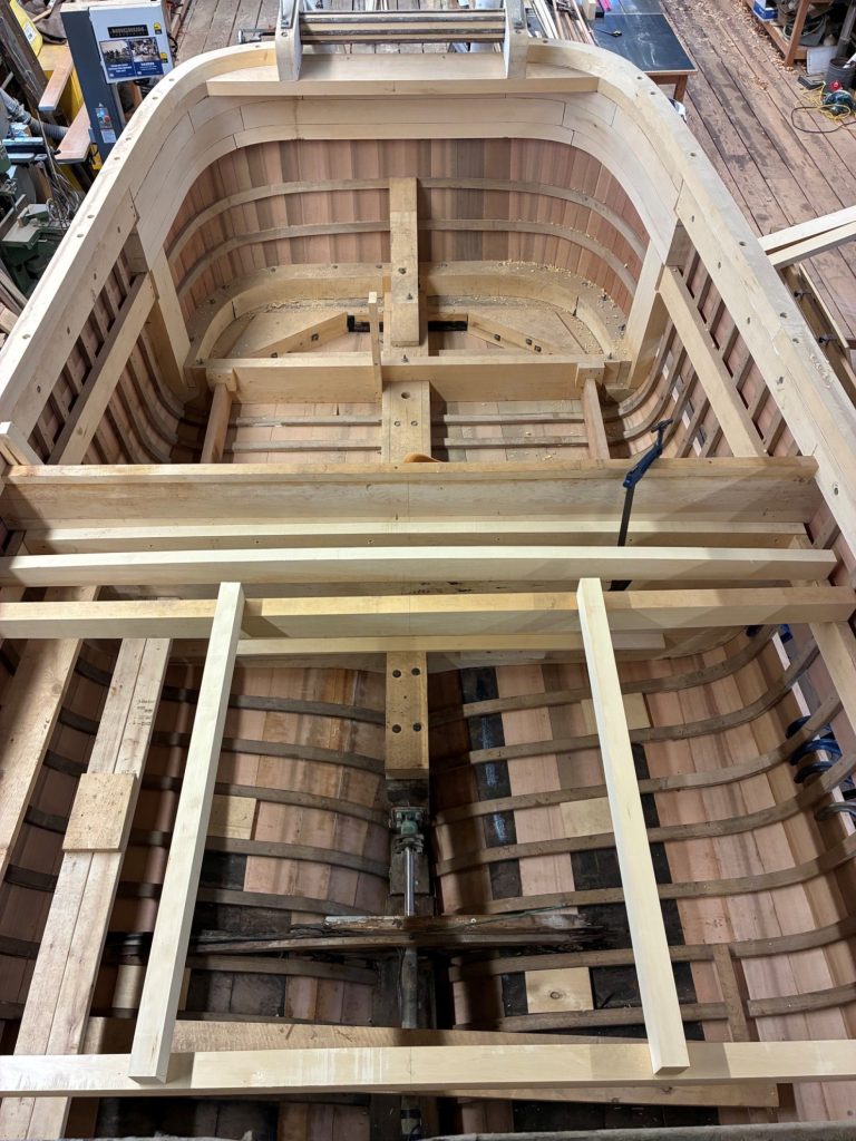 overhead view of wooden boat construction