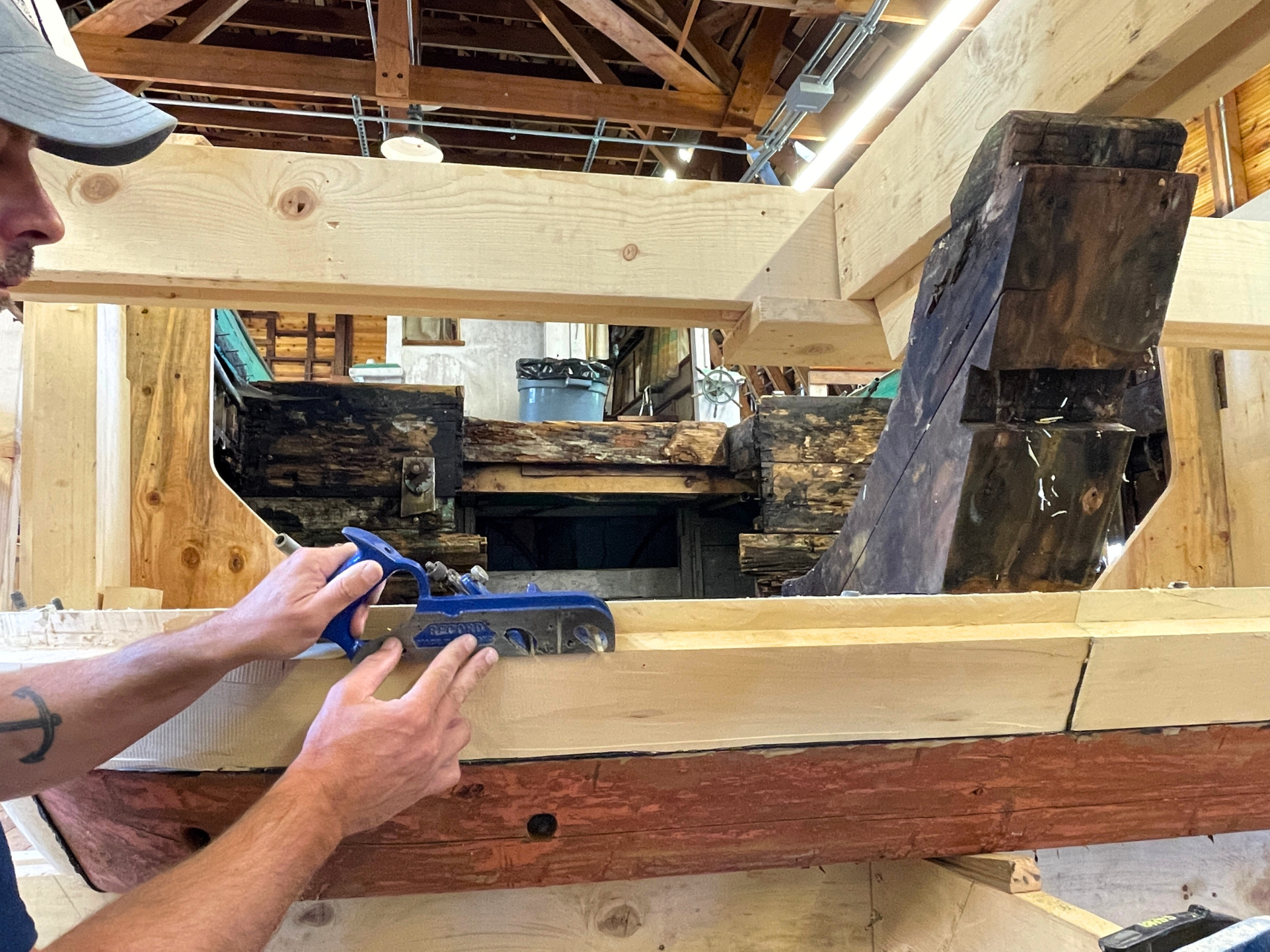 Dave demonstrating the rabbet plane on the Crystal S' stern