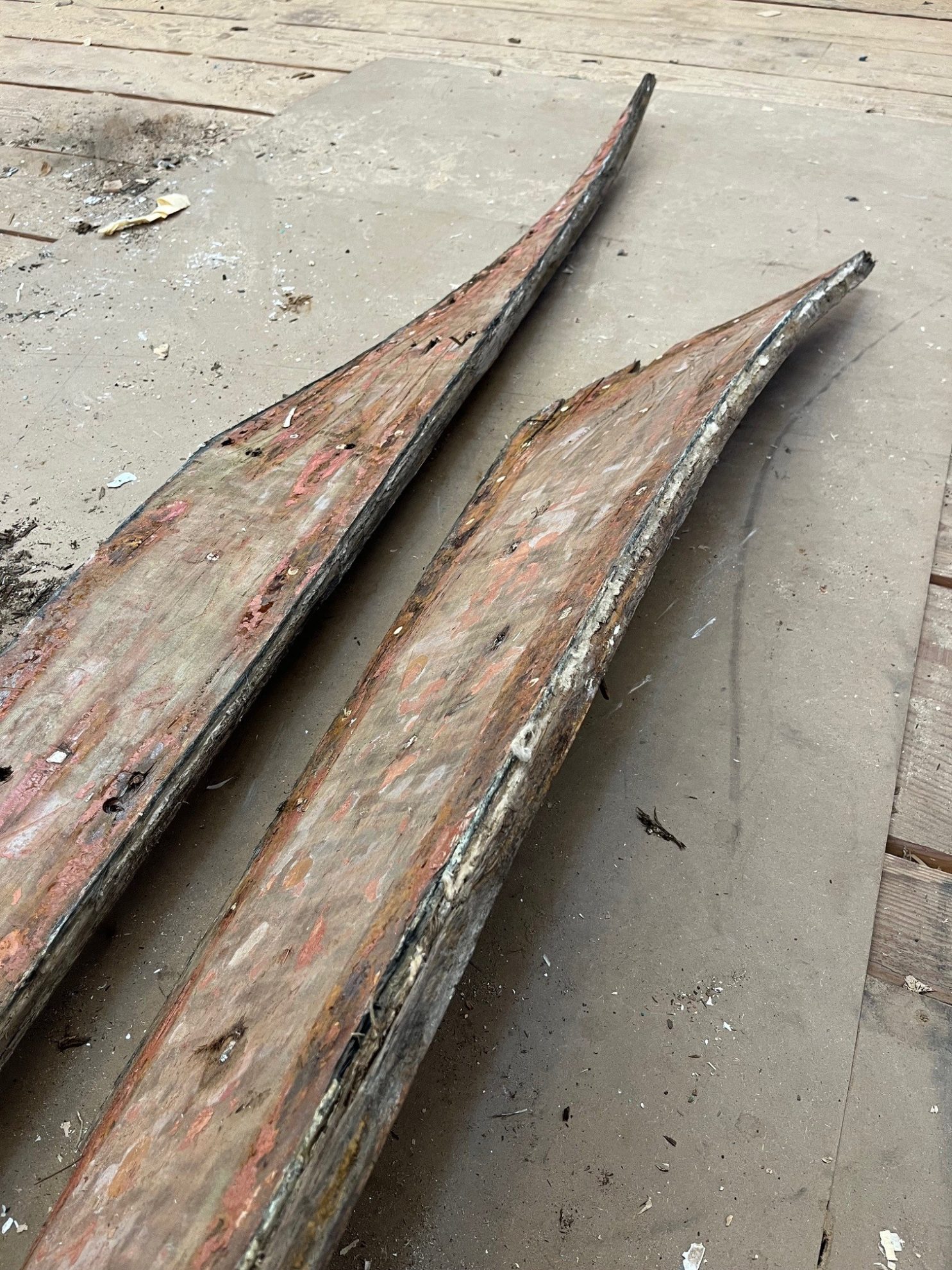 close up of old lumber with angled ends