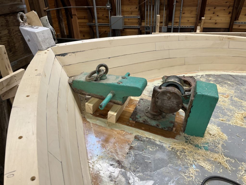 anchor hardware on unfinished wooden boat deck