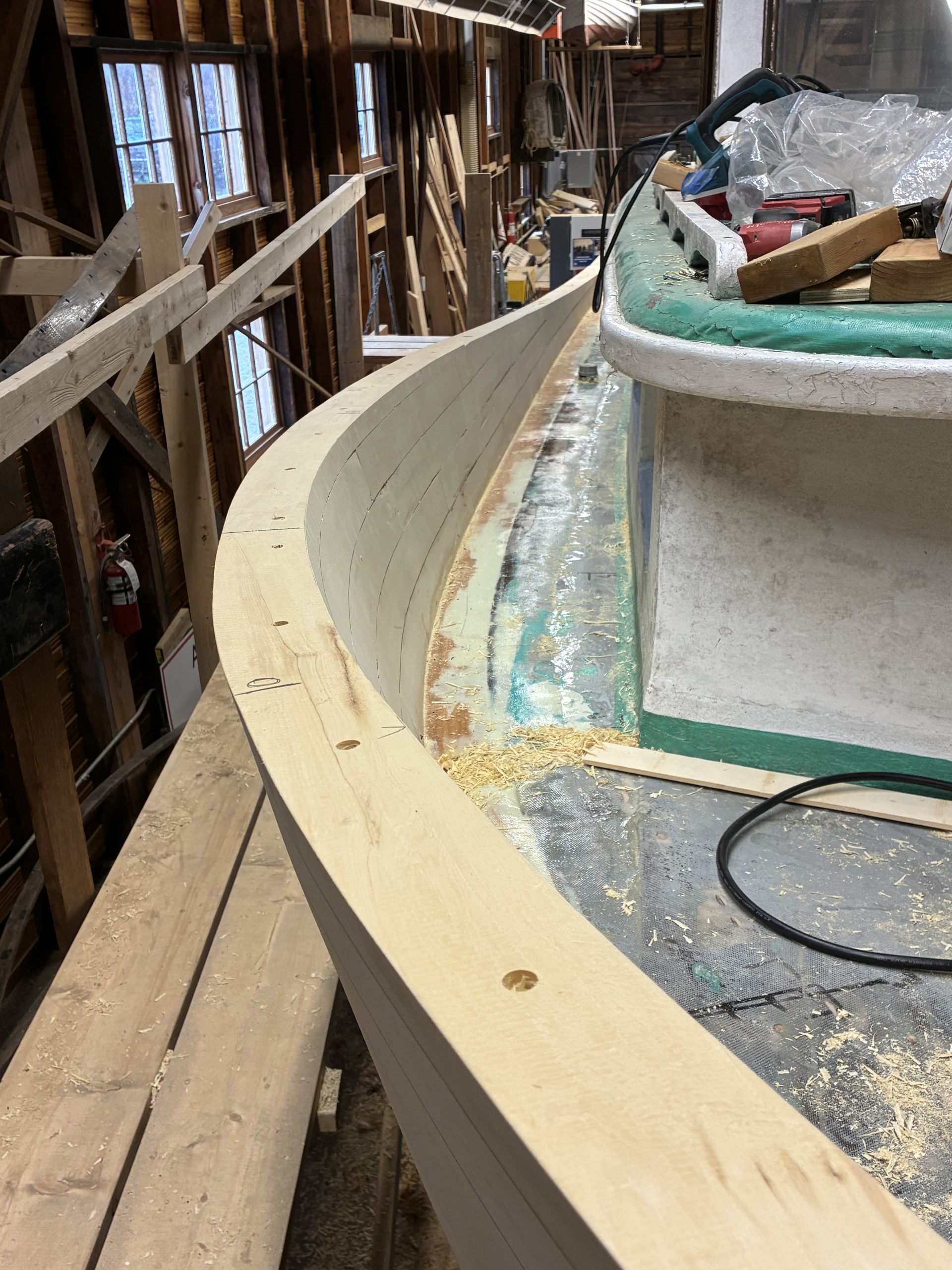 closeup of a curved piece of wood on a boat