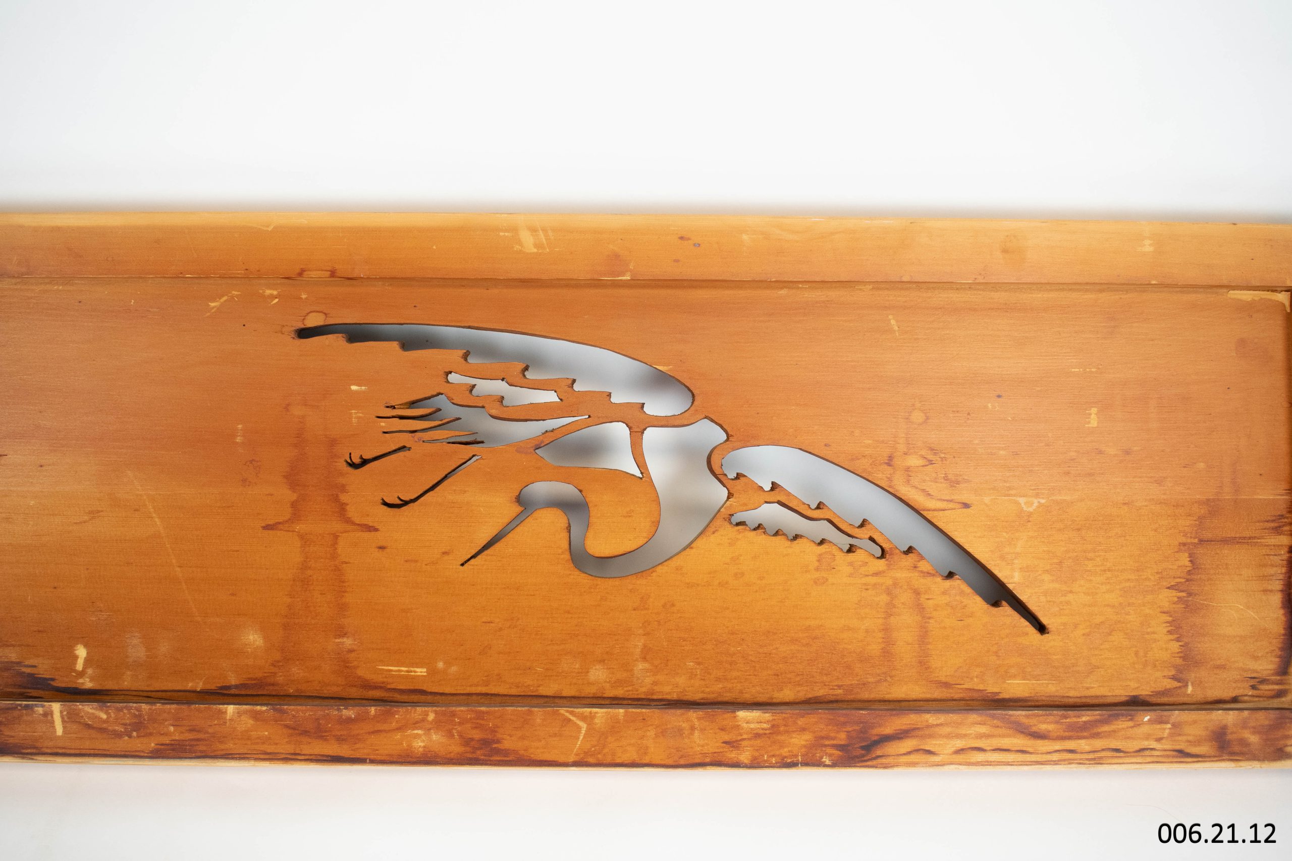 Japanese carved crane detail in wooden panel