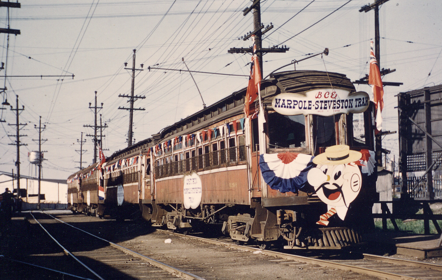 vintage photo of last marpole steveston tram run with animated character at front of tram
